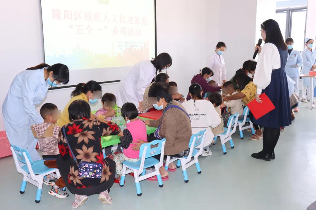 隆阳区残疾人文化进家庭“五个一”系列活动在我院举行